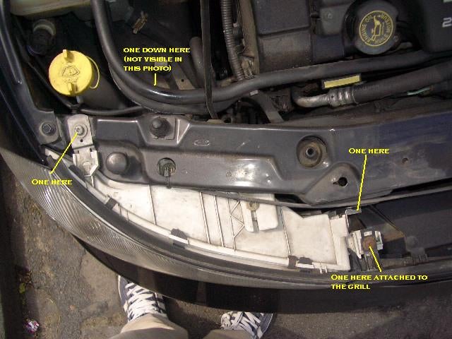 Ford focus headlamp unit removal #1